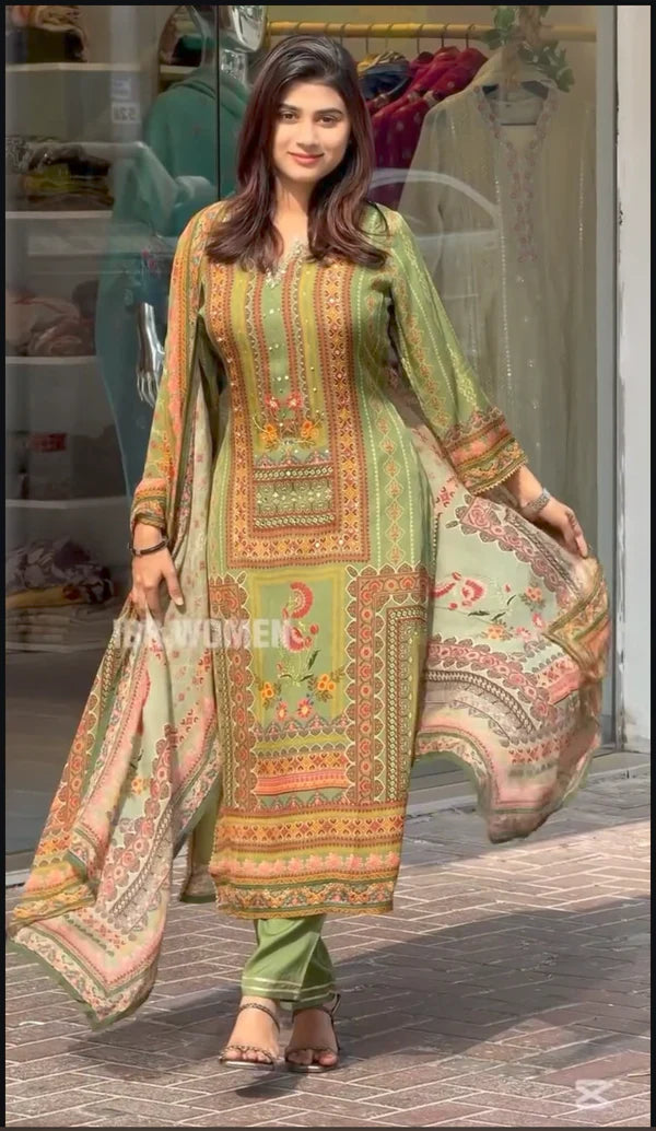 Green muslin handwork three pic suit set for women.